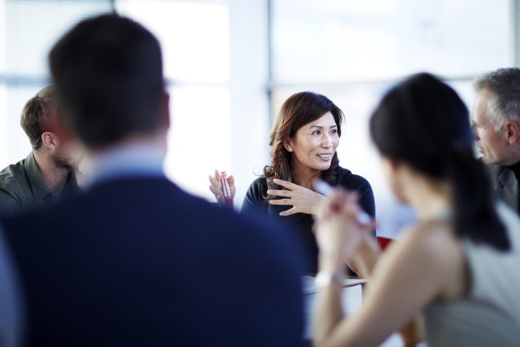 Business people talking in meeting